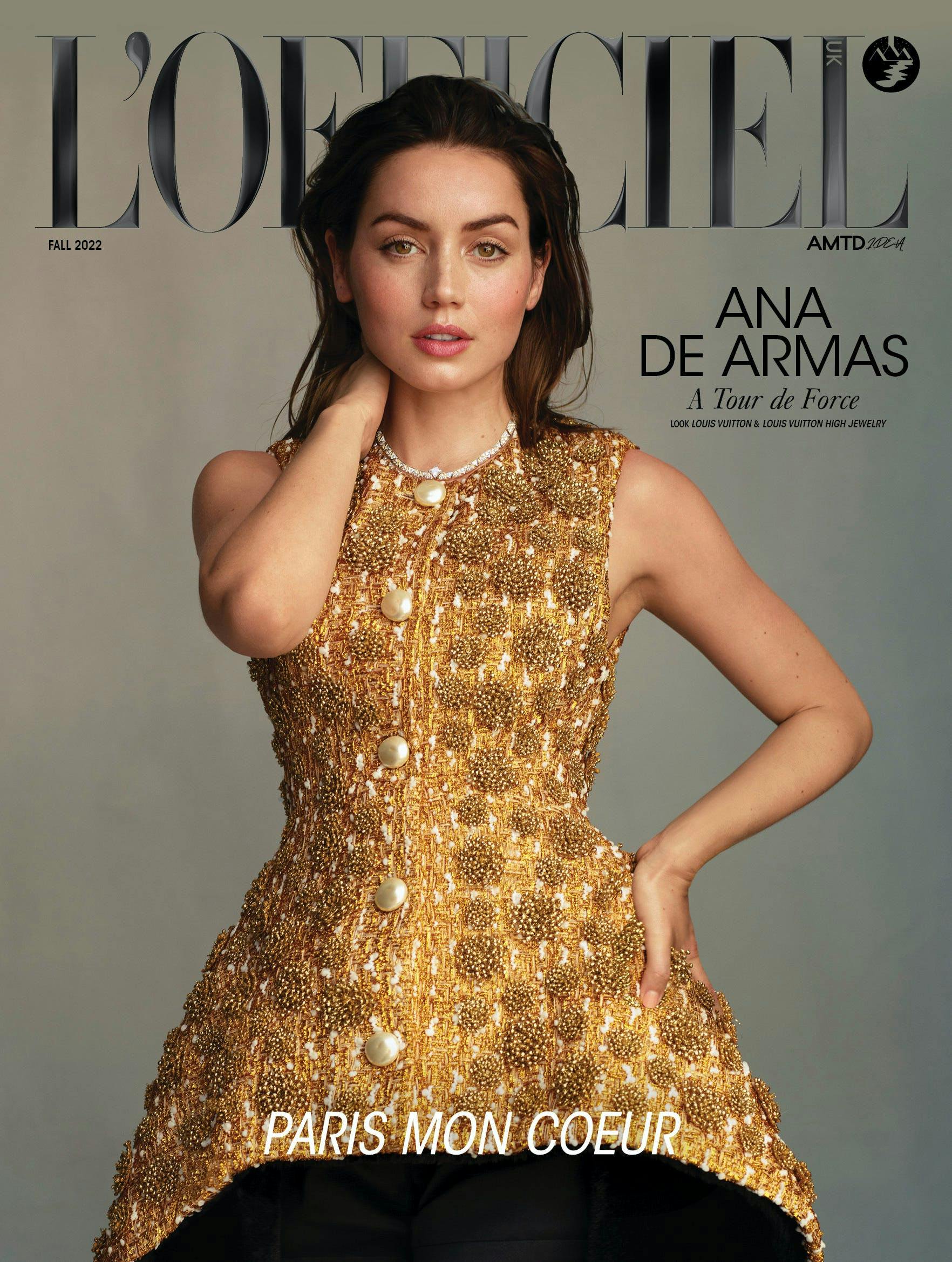 L'OFFICIEL UK Fall 2022 cover of Ana de Armas standing with one hand on her hip and the other on her neck wearing a gold embellished mini dress.
