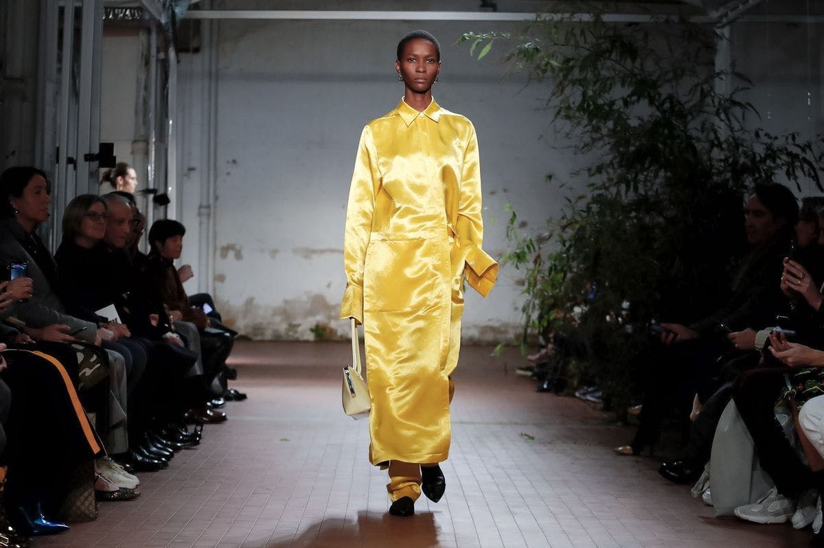 clothing apparel person human coat raincoat