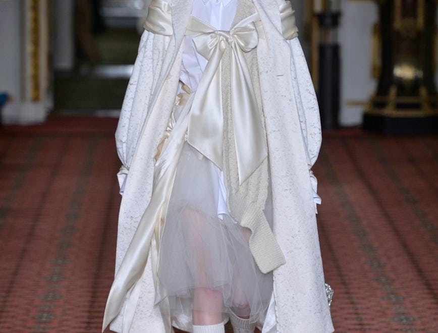 coat clothing apparel sleeve person human long sleeve fashion runway