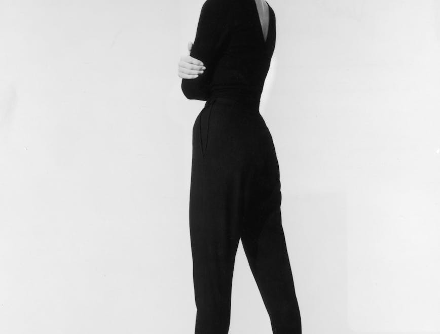 black & white;format portrait;looking over shoulder;female;film;publicity still;film actress;personality;american;belgian;dutch;british;english;g2107/040 sleeve clothing apparel female person human long sleeve dress woman standing