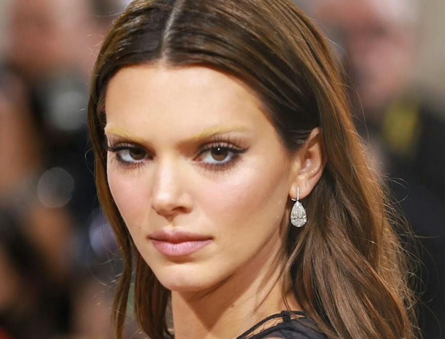 Kendall Jenner with light brown hair and bleached eyebrows
