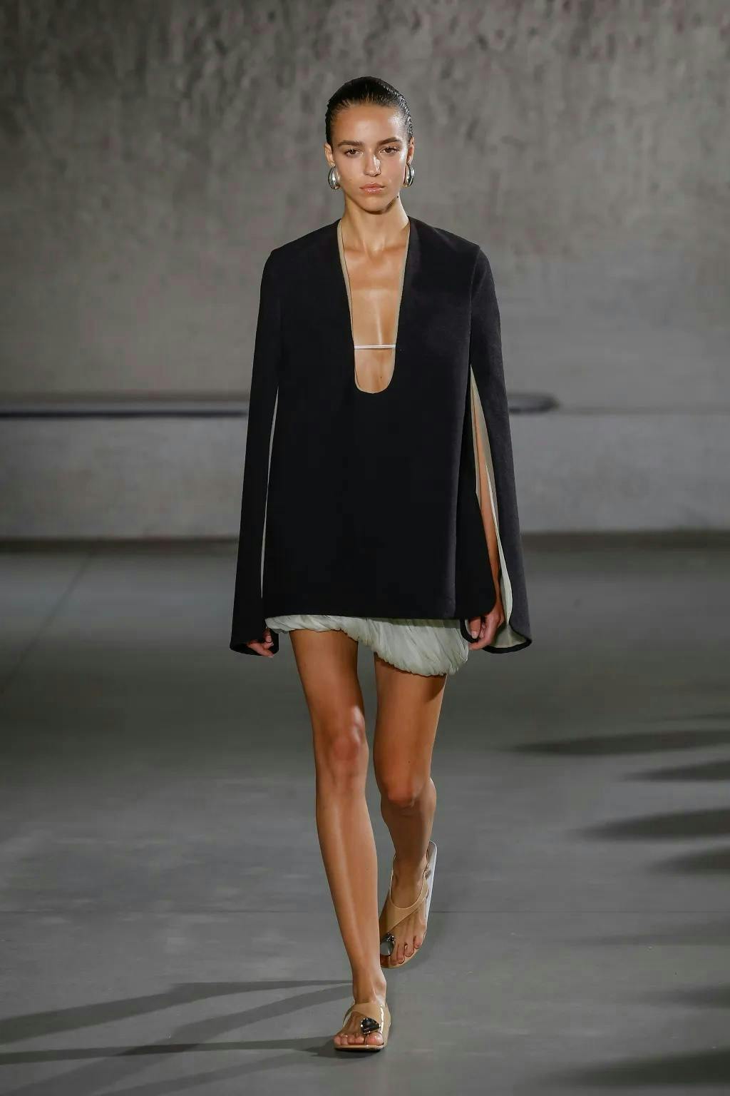 fashion person clothing footwear sandal skirt coat runway