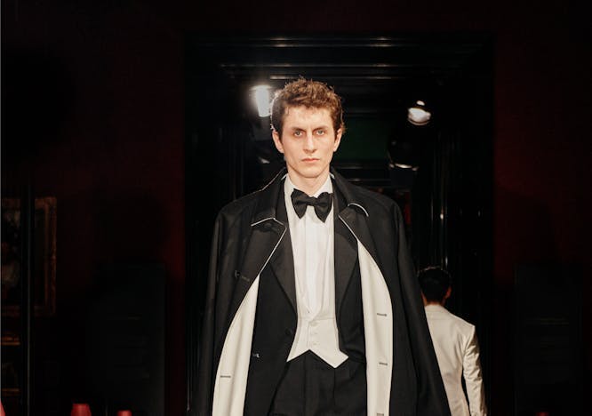 formal wear suit fashion floor flooring tuxedo coat adult man person